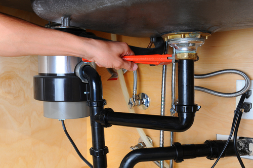 how to remove a garbage disposal locking ring